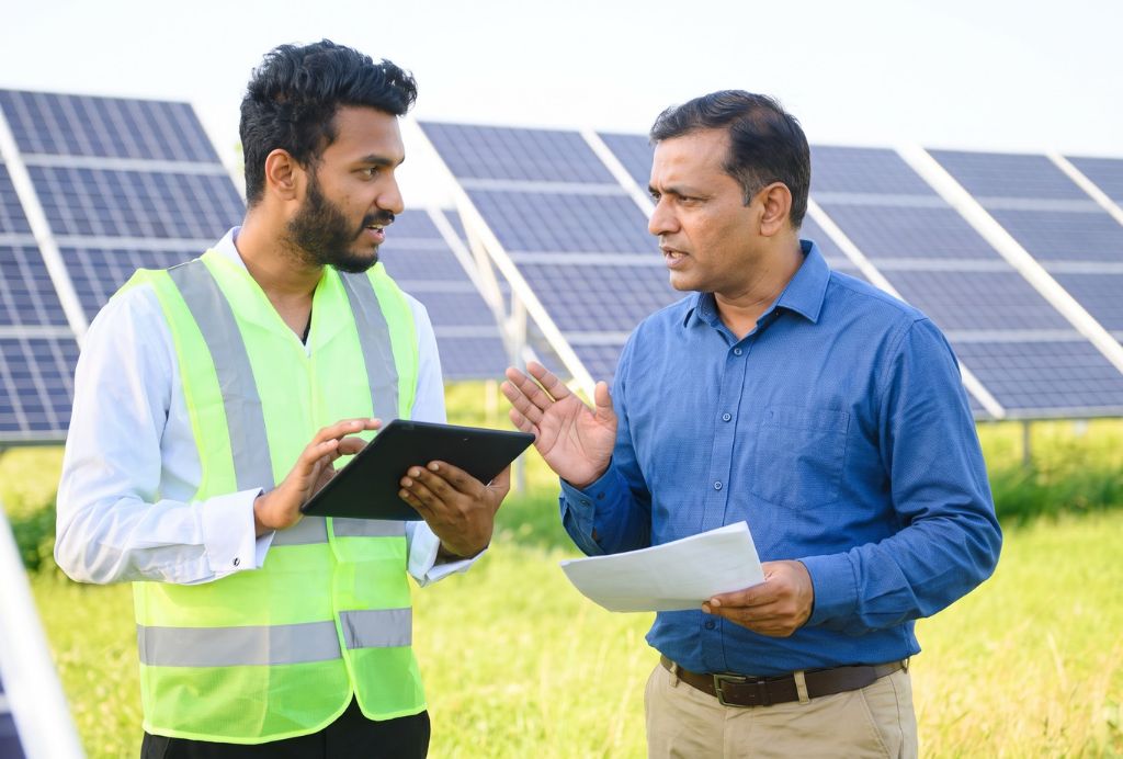 Solar consultant explaining CAPEX and OPEX options to a business owner